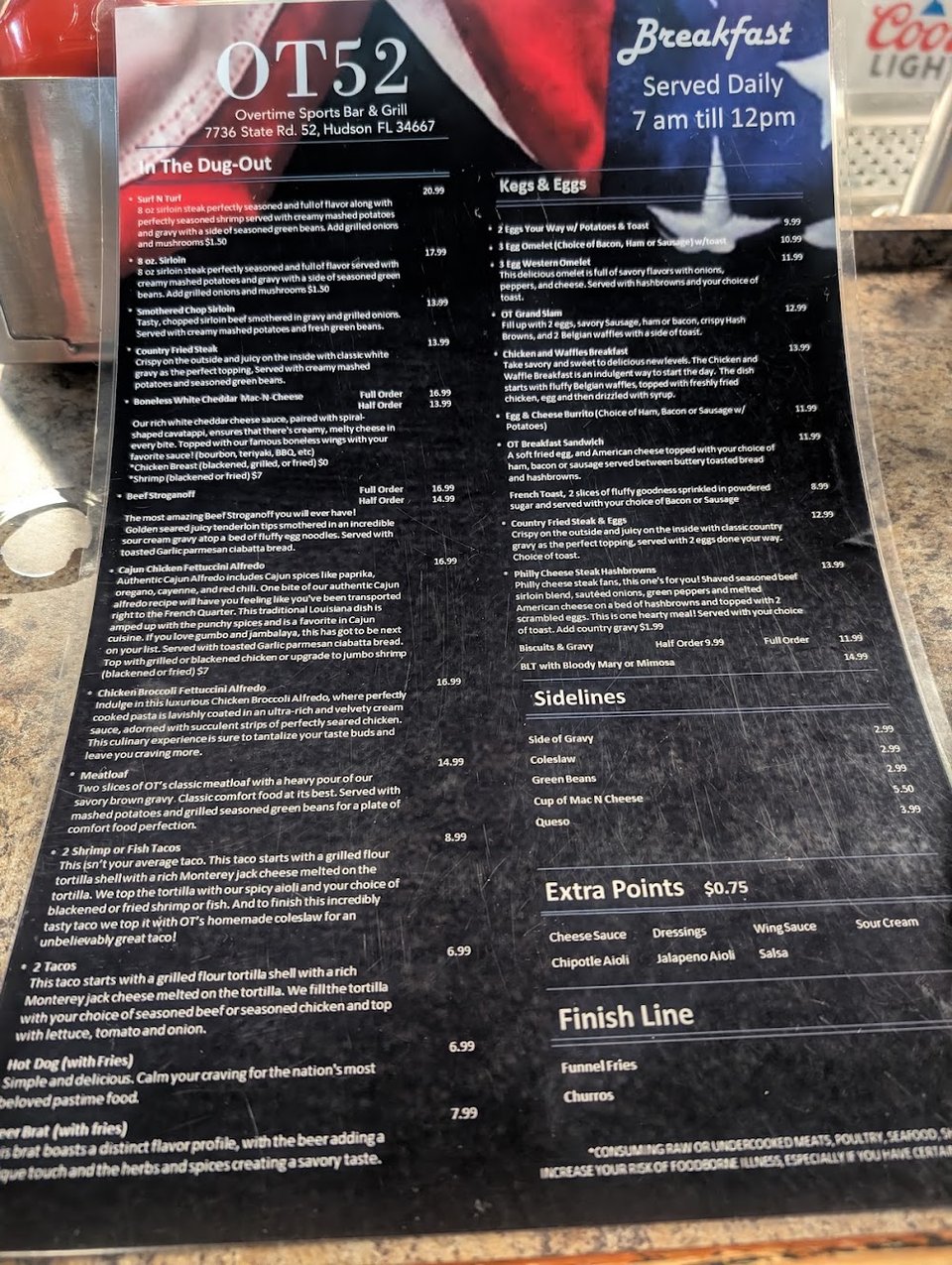 Printed menu showing breakfast and lunch choices.
